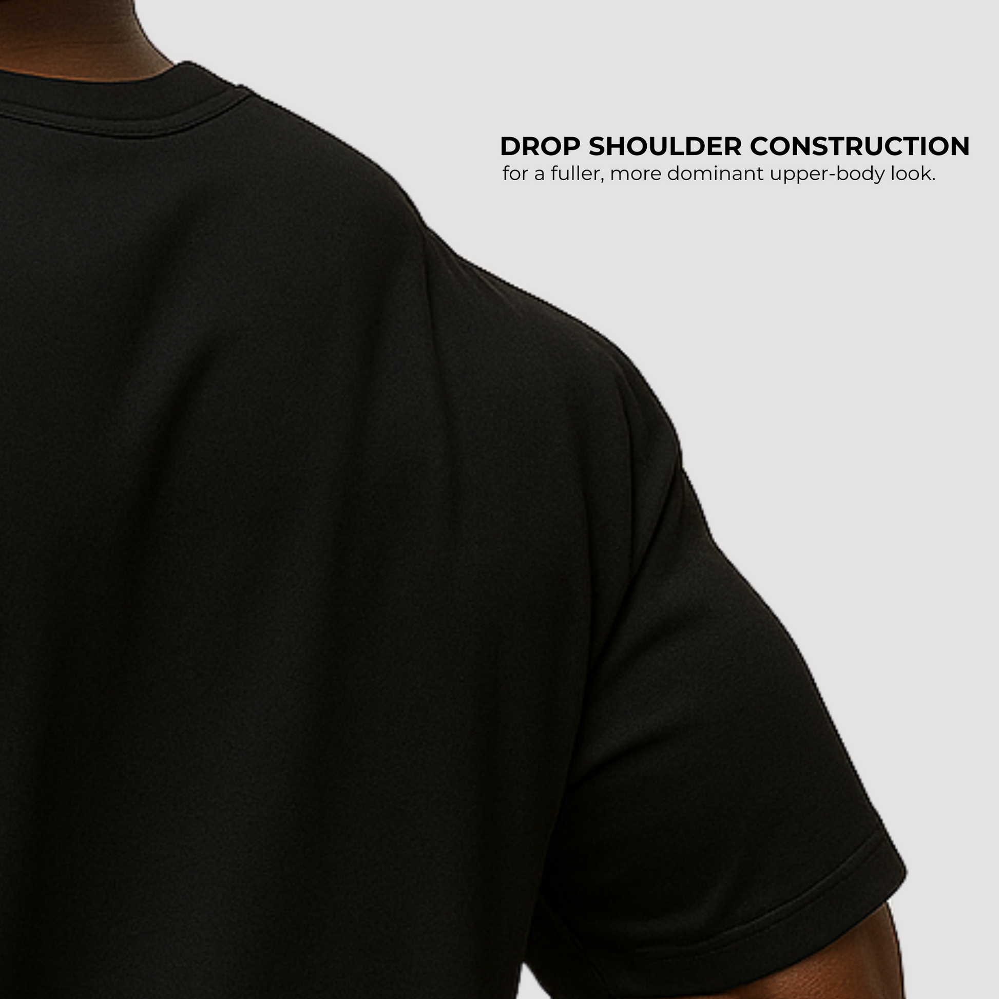 Relaxed oversized men’s black cotton gym t-shirt, back design, breathable durable gymwear.