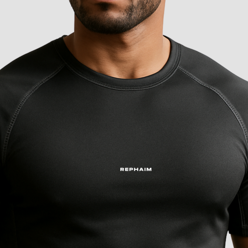 Men’s gym t-shirt India, compression fit black polyester spandex blend, chest logo front side