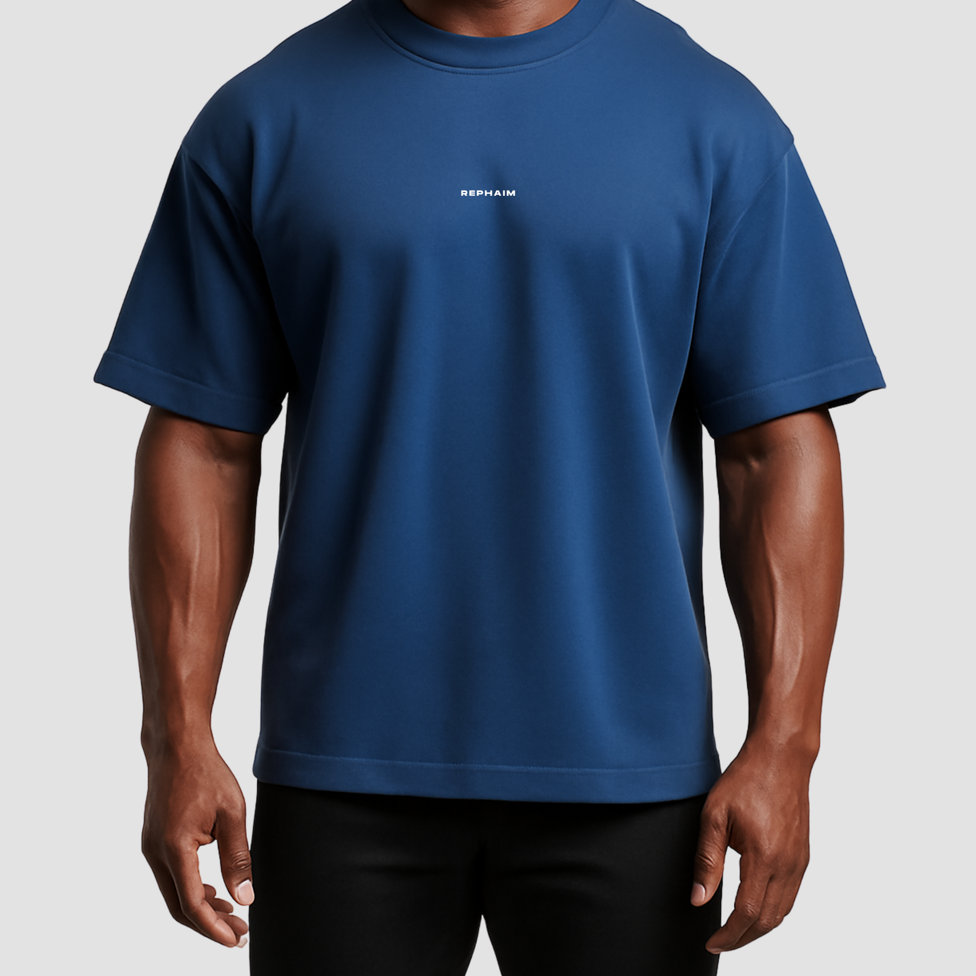 Oversized men’s gym t-shirt India in navy blue, 100% cotton, breathable, wrinkle-resistant with chest logo.