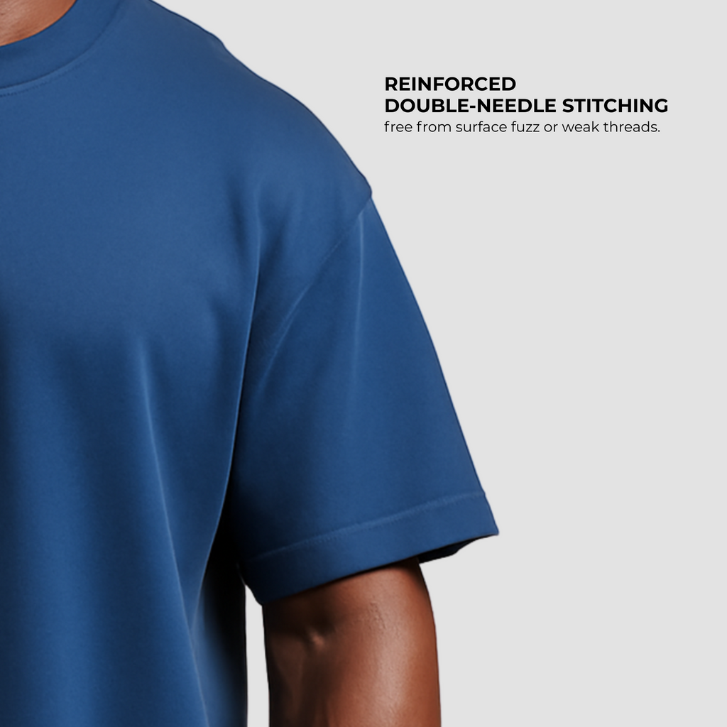 Oversized men’s gym t-shirt India in navy blue, 100% cotton with reinforced double-needle stitching for durability.