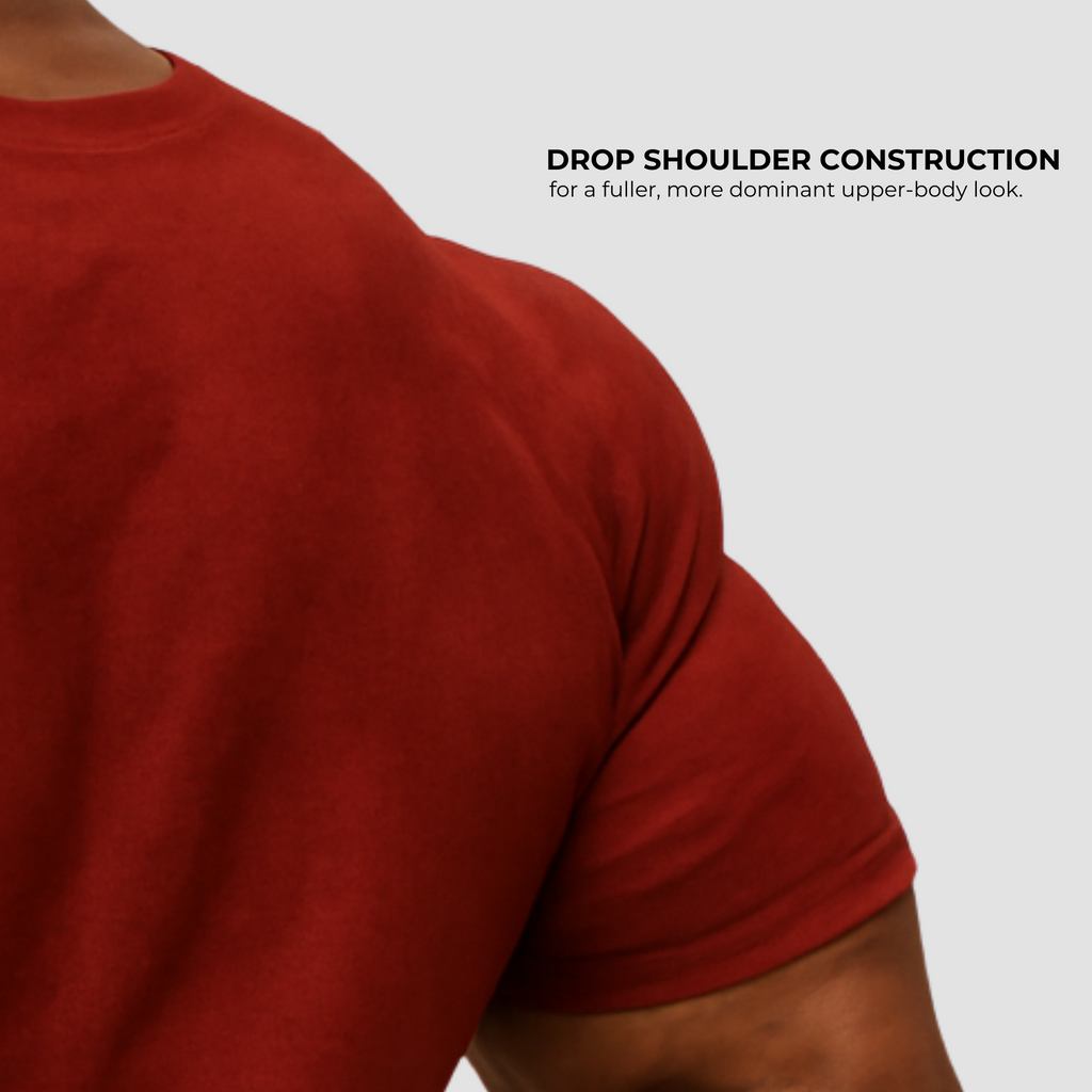 Maroon men’s oversized gym t-shirt India, cotton drop shoulder design for fuller athletic upper body look.