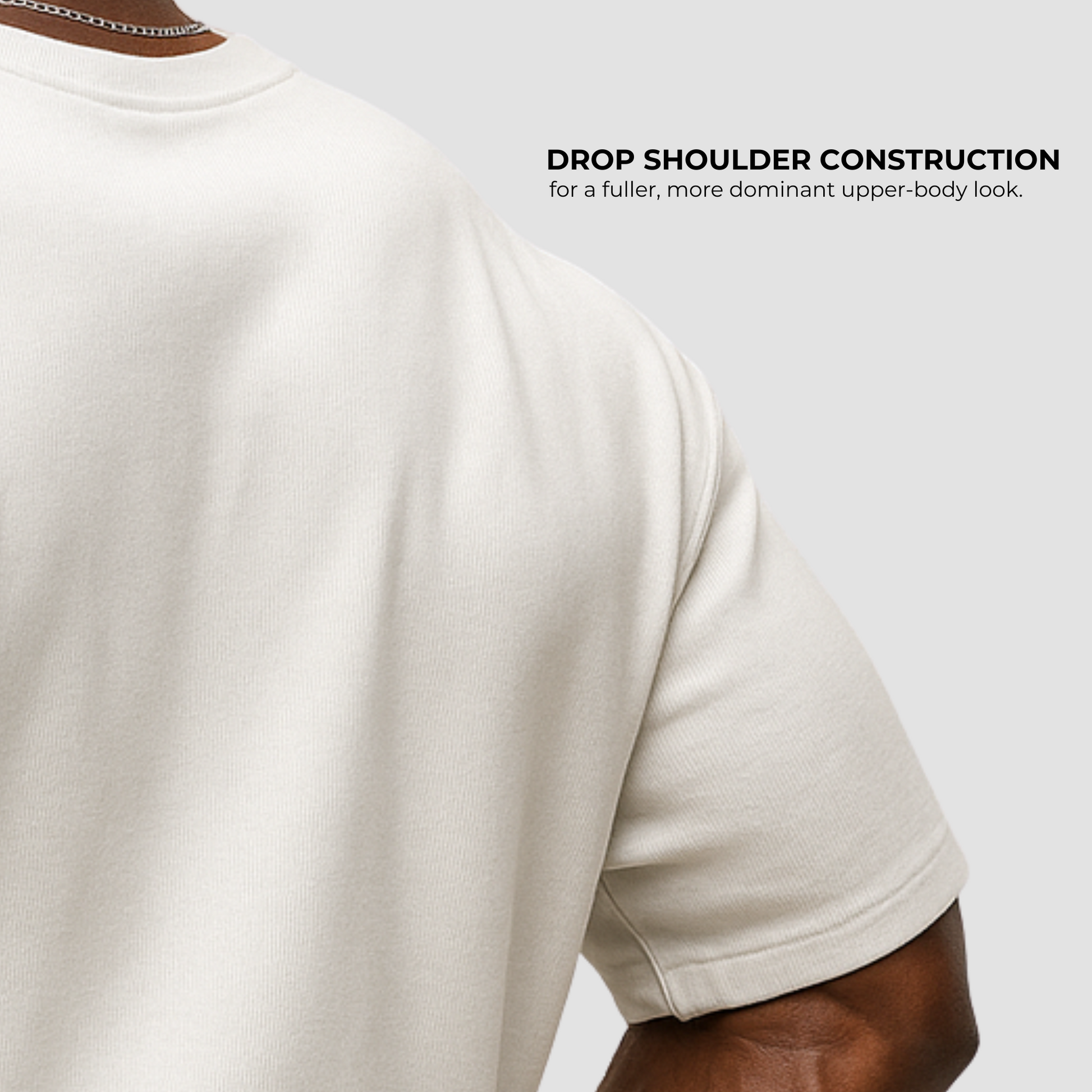 Back view of men’s oversized white cotton gym t-shirt with drop shoulder and athletic fit, India